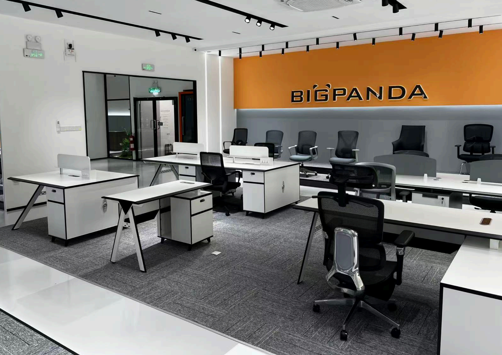 Big Panda showroom display area with workstations and office chairs
